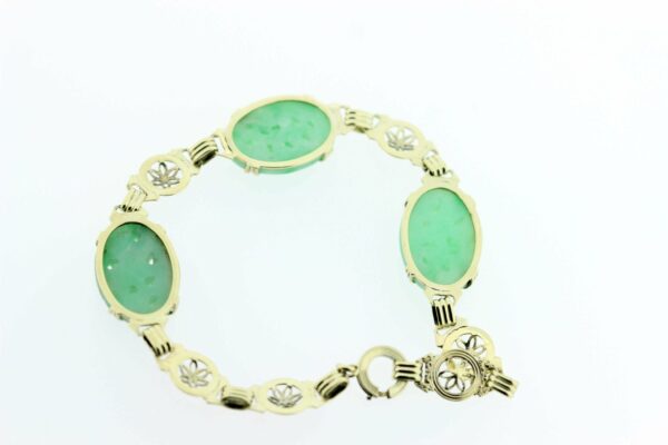 Timekeepersclayton 10K gold Jade carved bracelet