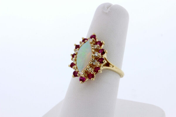Timekeepersclayton 14K Yellow Gold Ring With Opal Center and Diamond and Ruby Halo