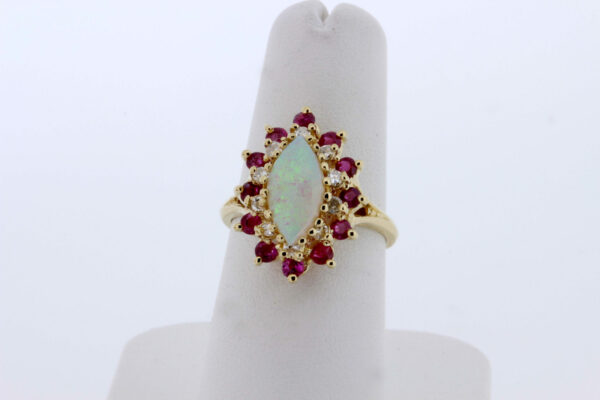 Timekeepersclayton 14K Yellow Gold Ring With Opal Center and Diamond and Ruby Halo