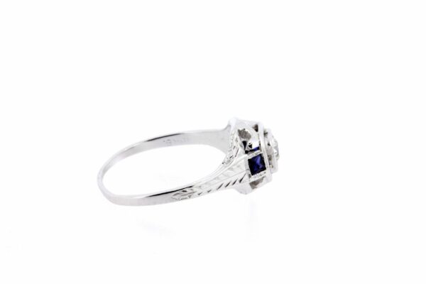Timekeepersclayton 18K Gold Chevron Engraved Ring with Euro Cut Diamond Center and Synthetic Square French Cut Blue Sapphires