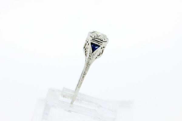 Timekeepersclayton 18K Gold Ring with Trillion cut blue accents and Diamond Center