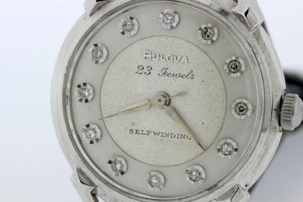 Timekeepersclayton 23 jewel, self-winding, diamond dial 14K Gold Bulova Wrist Watch