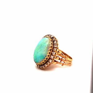 Alluring 14K Yellow Gold Vintage Oval Opal Cabochon Ring with Diamond Halo