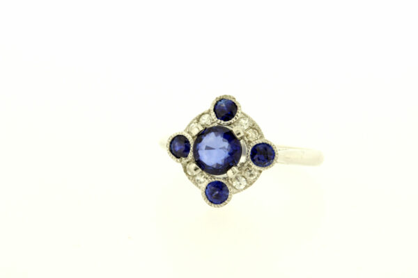 Platinum Ring 0.16ct diamond 0.60 blue sapphire