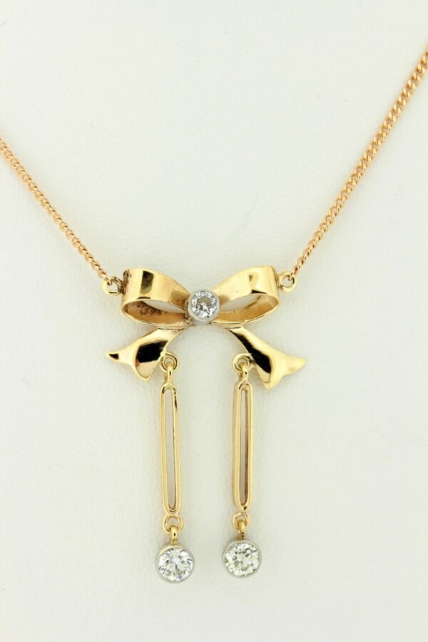 Timekeepersclayton Vintage 14K and 10K Gold Bow Necklace with Old Euro Cut Diamond Drops
