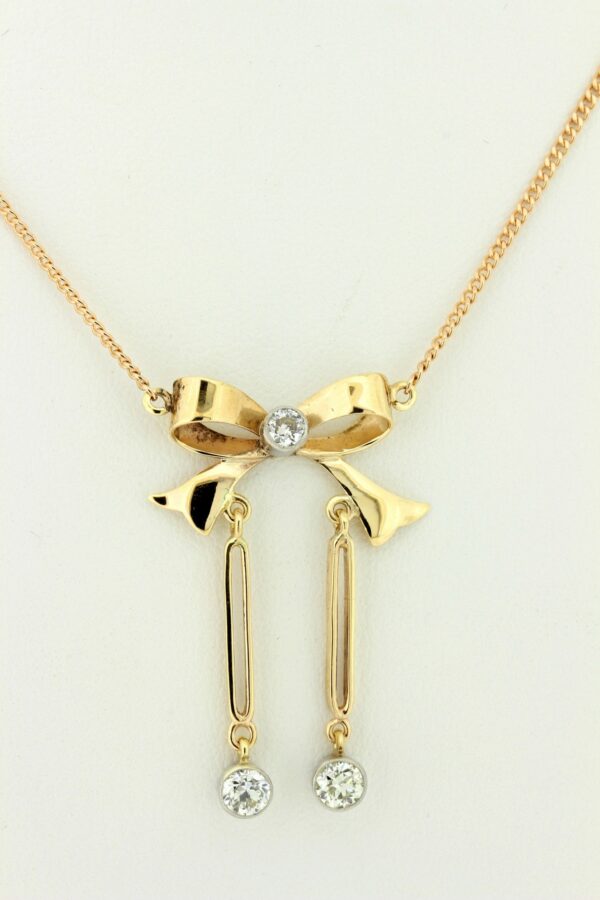 Timekeepersclayton Vintage 14K and 10K Gold Bow Necklace with Old Euro Cut Diamond Drops